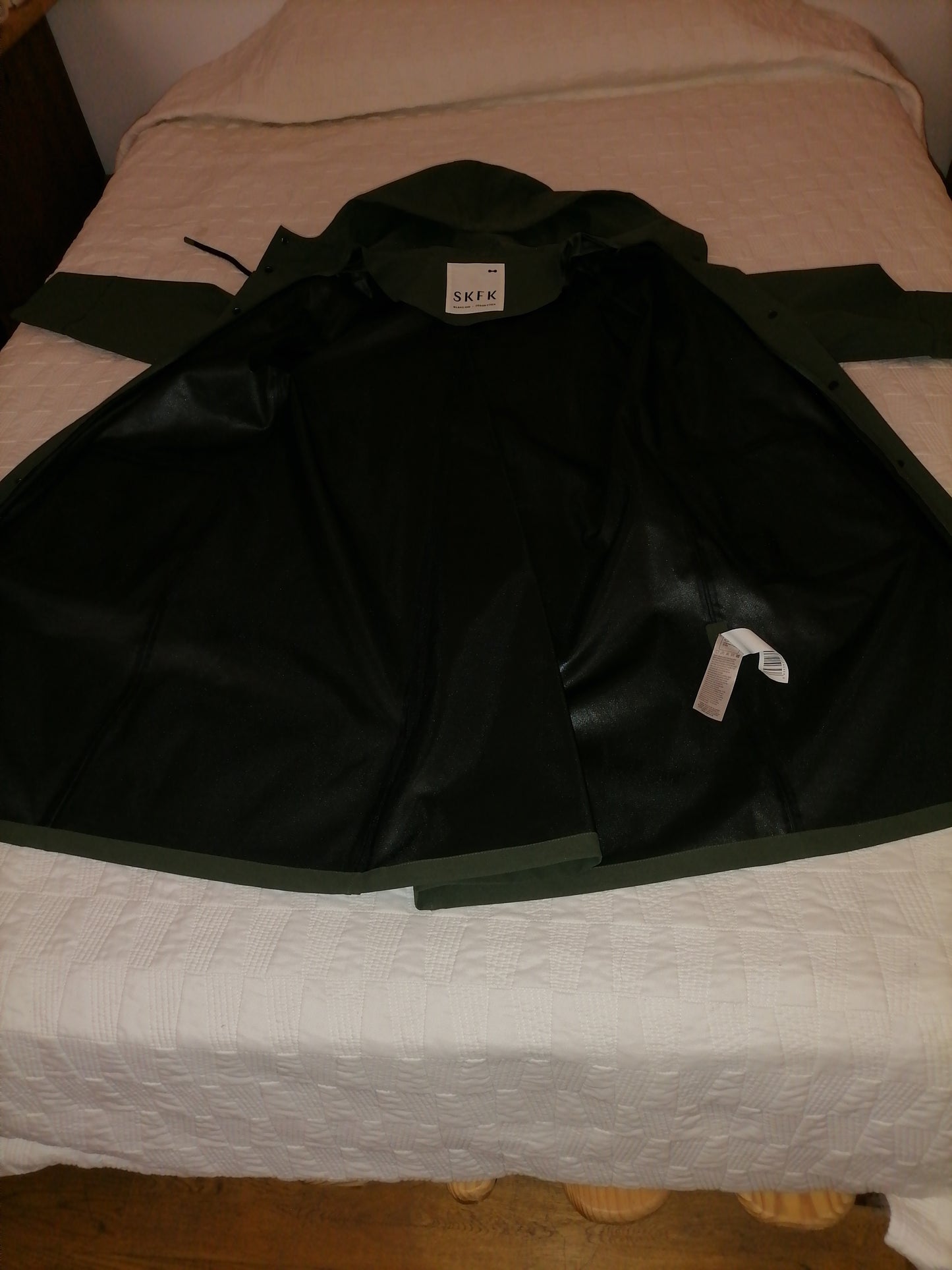 Imperméable vert presque jamais porté