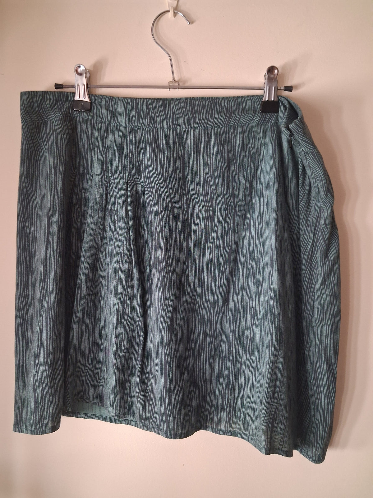 Minifalda verde con forro
