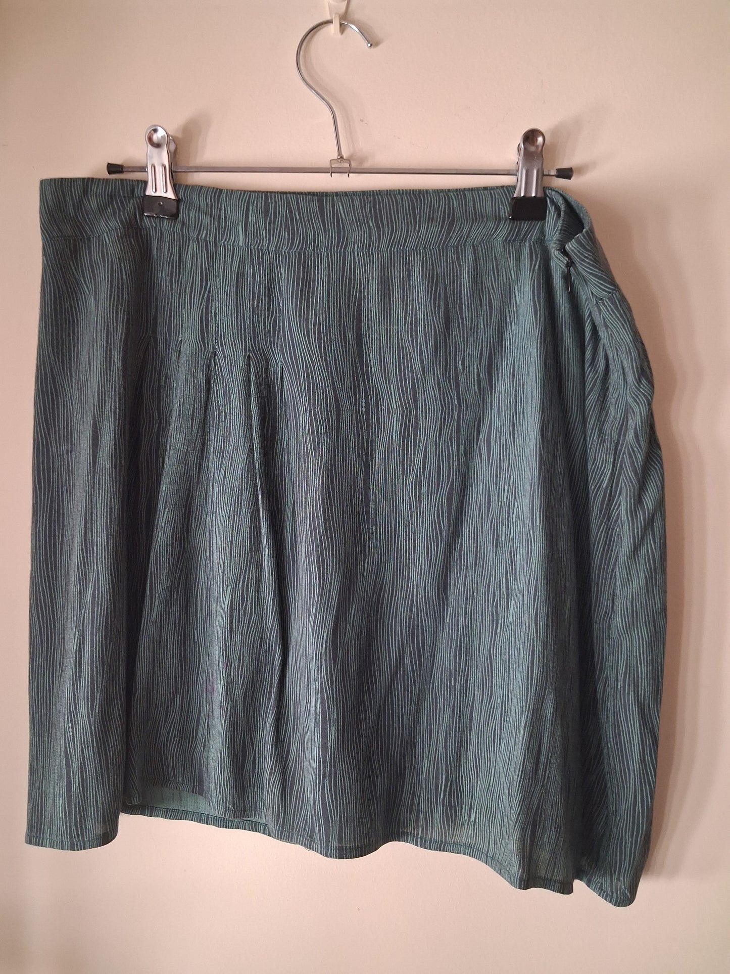 Minifalda verde con forro