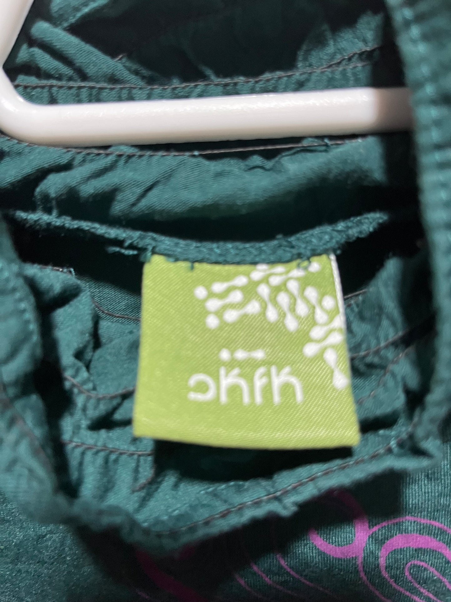 Parte superior verde oscuro